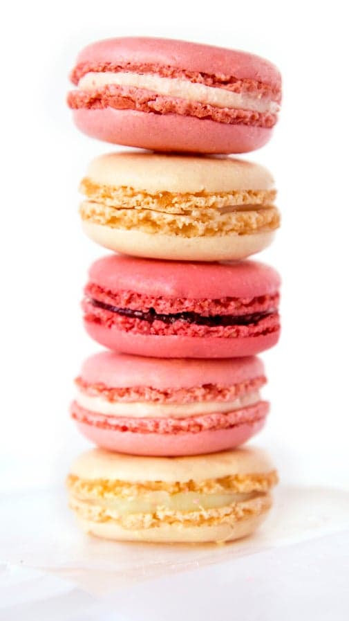 stack of pink and yellow Macarons