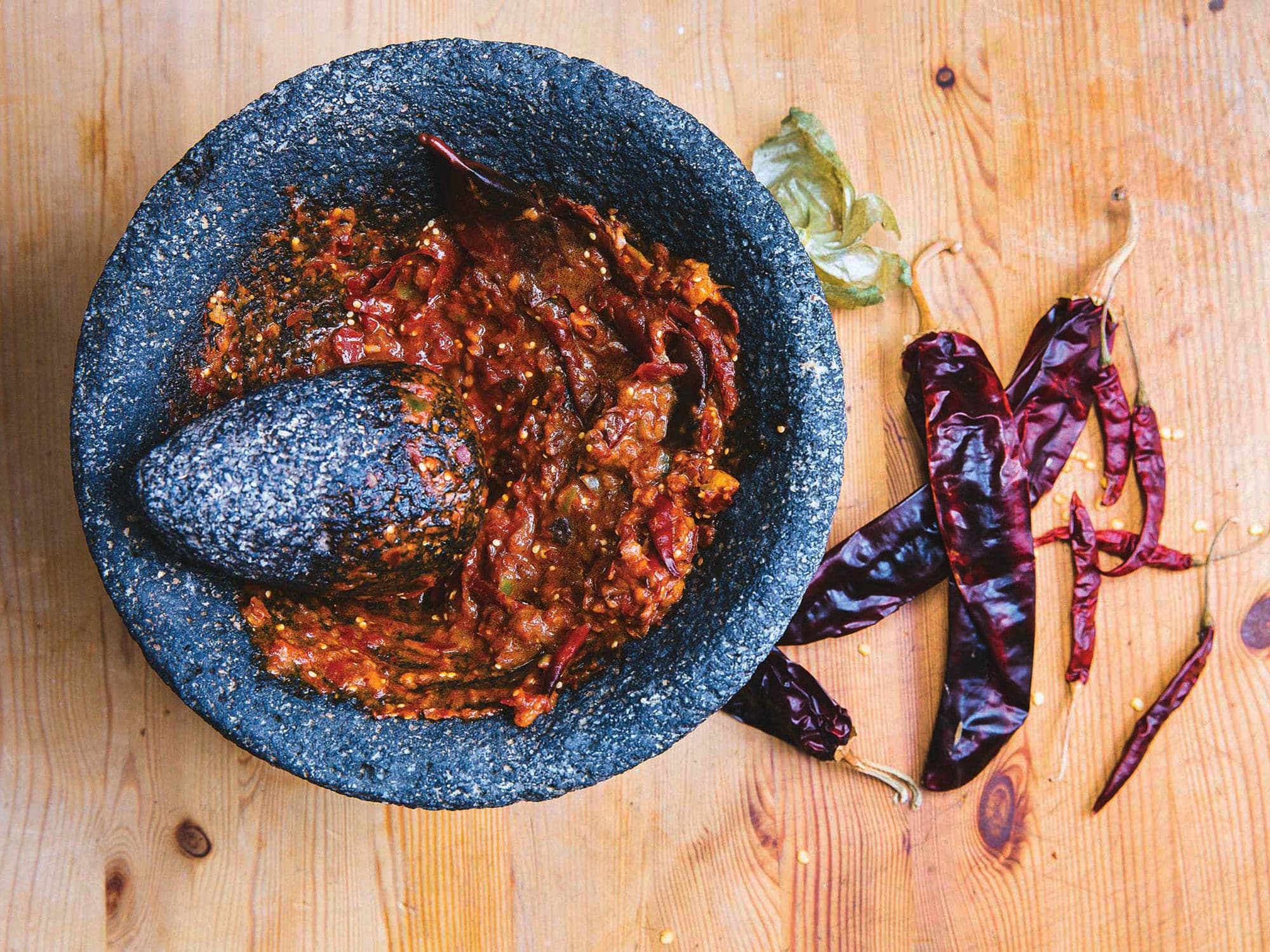 homemade salsa in a mortar and pestle