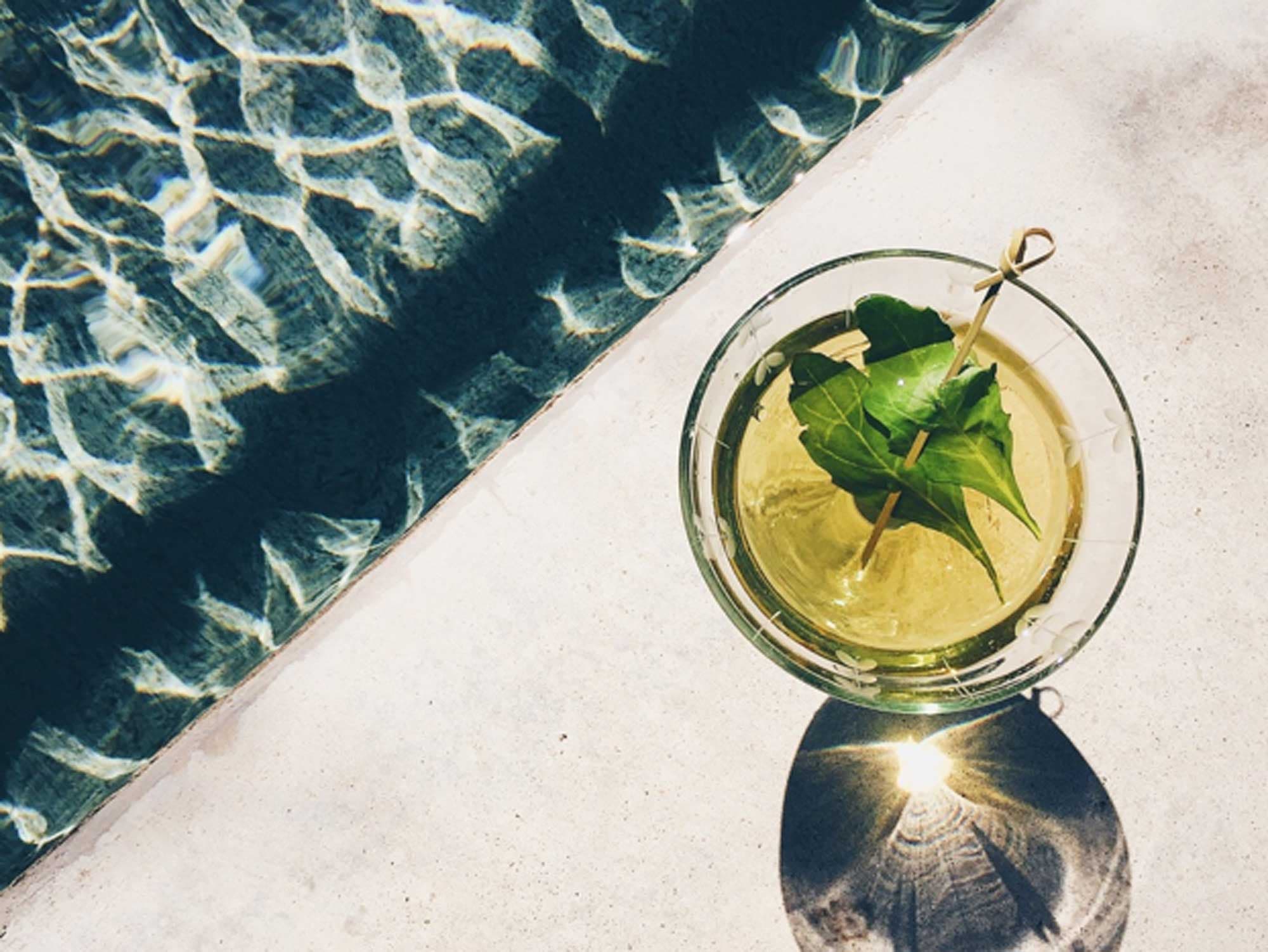 Epazote-infused gin martini by the pool