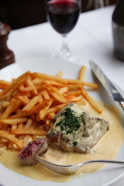 Pan-fried steak with mustard cream sauce at Chez Georges Bistro Paris