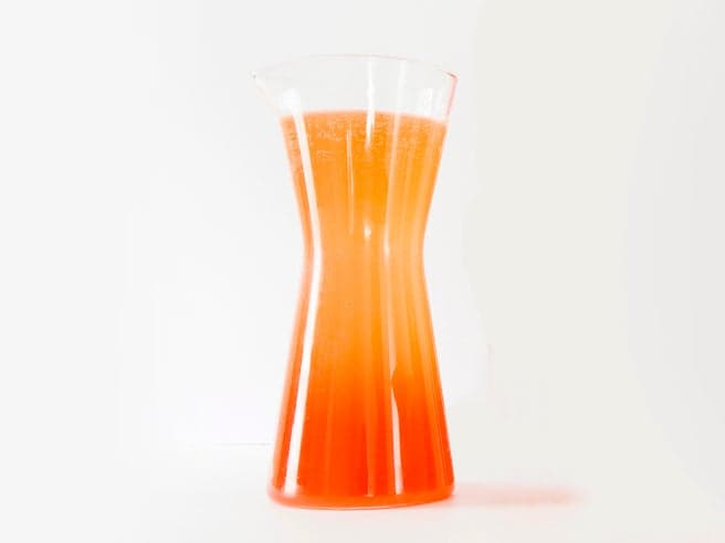 Trendy glass beaker pitcher for serving summer cocktails, punch, and drinks.