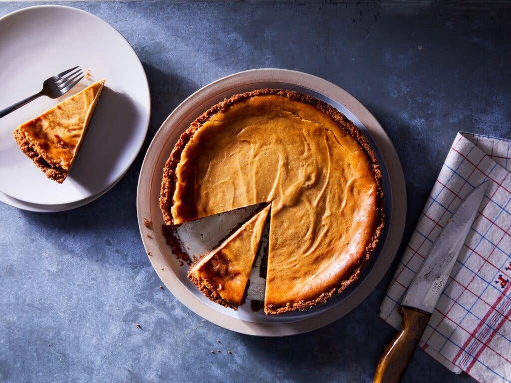 Pumpkin Cheesecake Recipe on black background