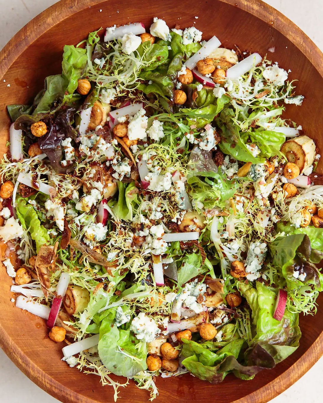 image of Roasted Parsnip Salad With Hazelnuts, Blue Cheese, and Wheat Beer Vinaigrette recipe by Saveur
