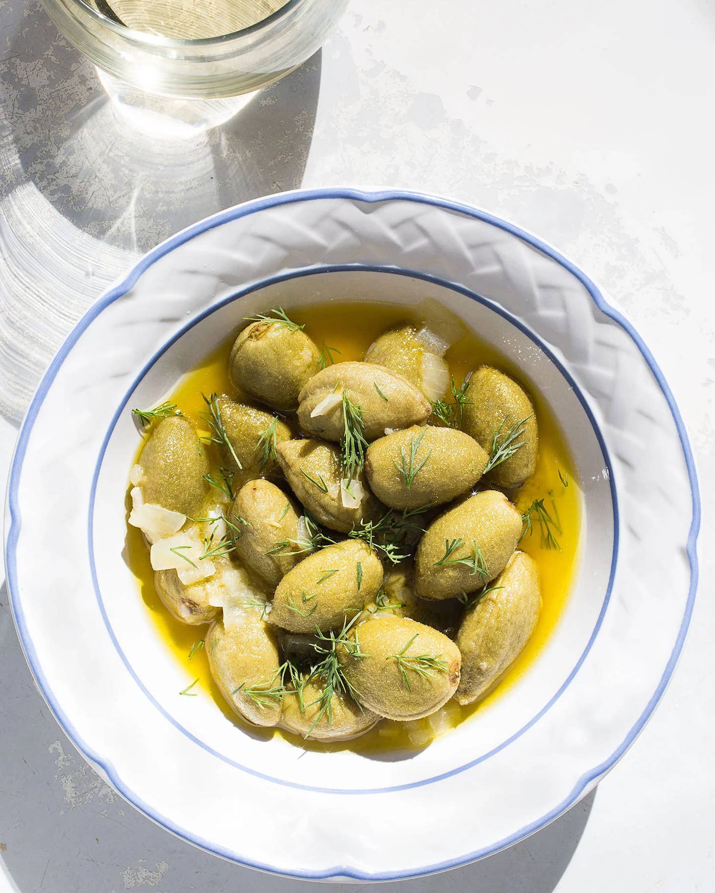 Olive Oil-Poached Green Almonds With Dill