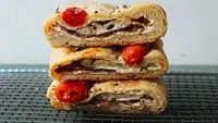 Salami, Smoked Mozzarella, and Basil Stromboli-image