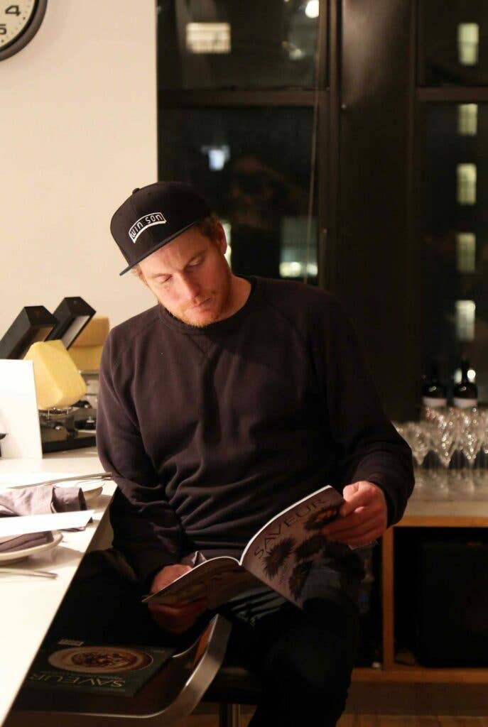 man reading magazine