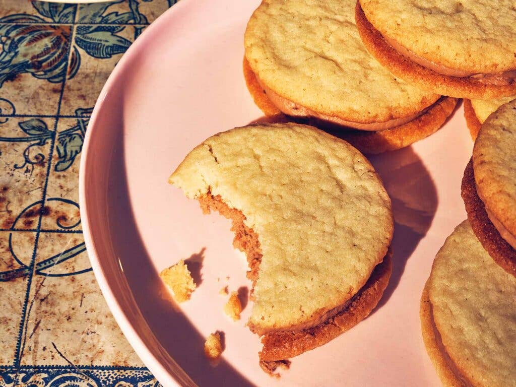 Sugar Cookies Sandwiches with Cardamom Milk Chocolate Ganache