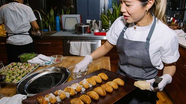 Chef Esther Choi plates her pizza dumplings