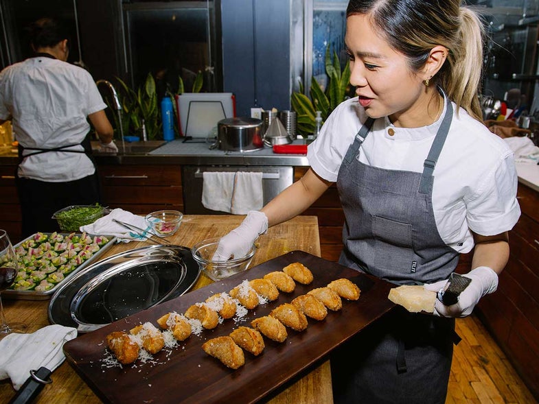 Chef Esther Choi plates her pizza dumplings