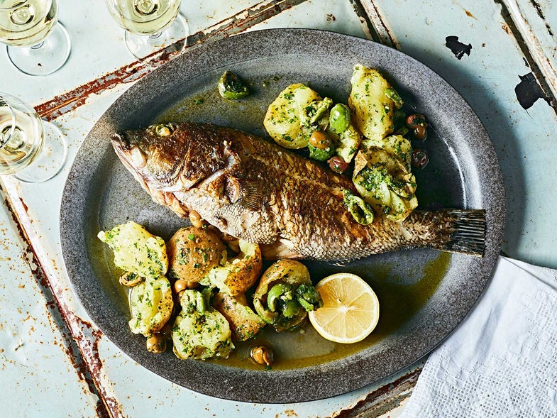 Whole Roasted Black Bass with Potatoes, Green Olives, and Salsa Verde