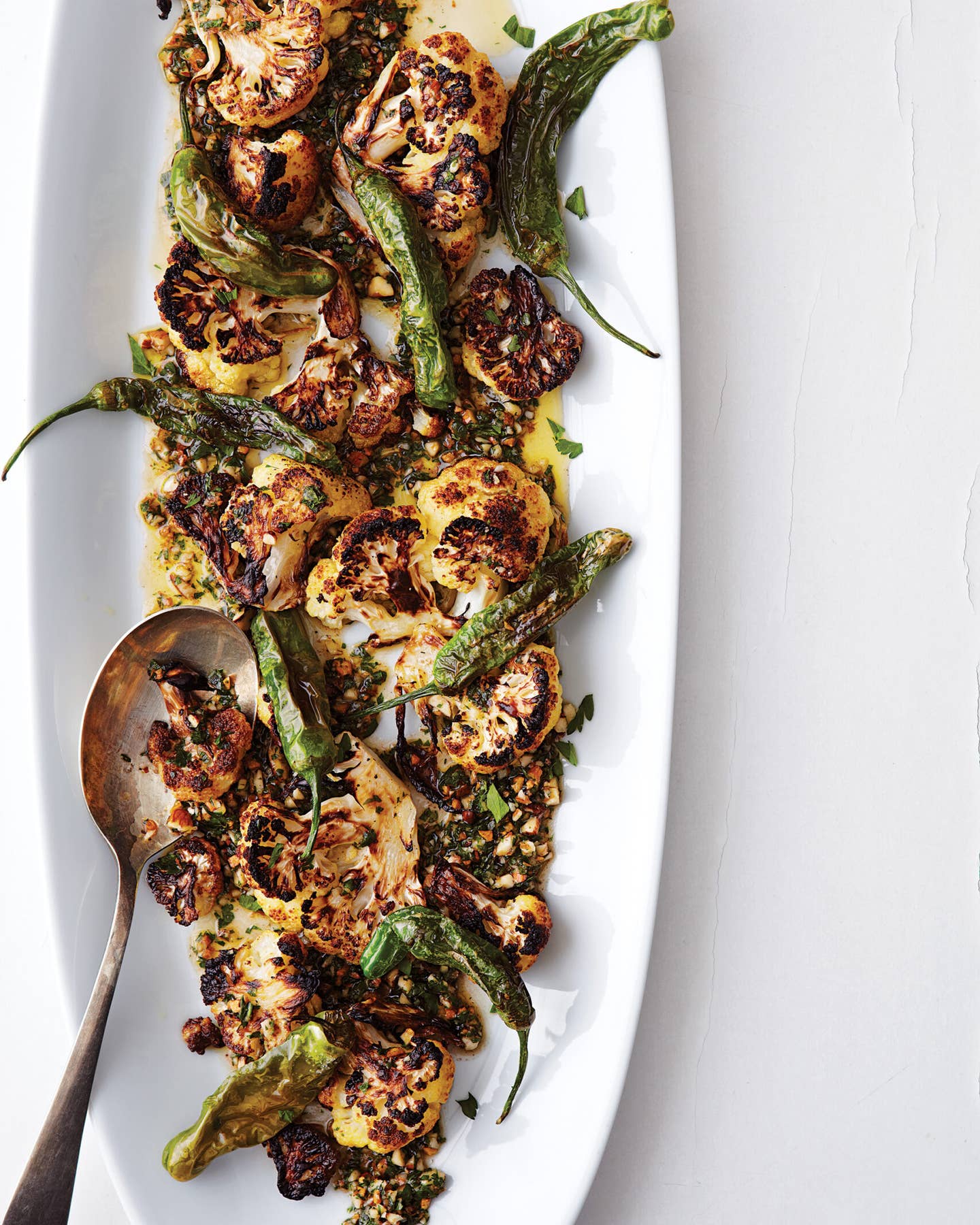 Charred Cauliflower and Shishito Peppers with Picada Sauce