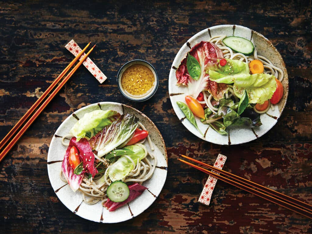 Soba salad recipe with summer greens on two plates