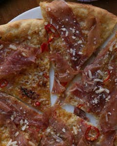 Prosciutto, Chile, and Onion Pizza