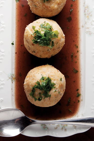 Bread dumplings seasoned with onion, parsley, and nutmeg