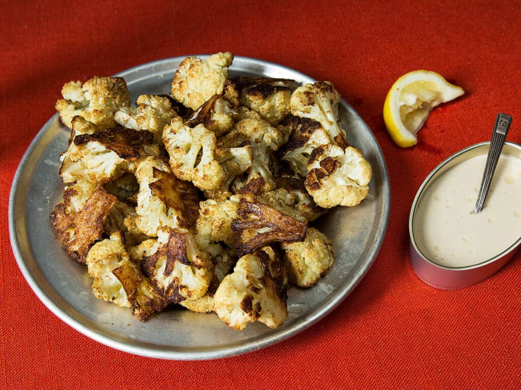 ROASTED CAULIFLOWER WITH TAHINI SAUCE