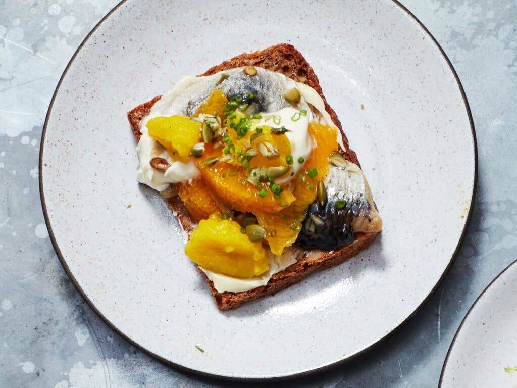 Copenhagen, Smorrebrod, Pickled herring, oranges, creme fraiche