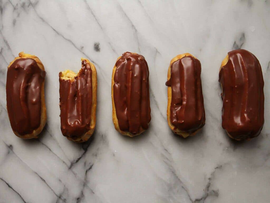 chocolate covered French eclairs filled with cream