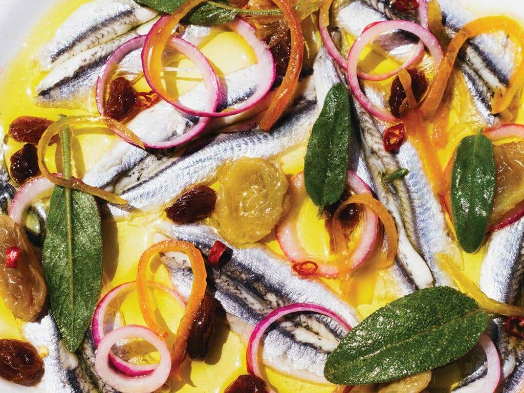 Marinated Anchovies with Candied Citrus, Pickled Raisins, and Chile