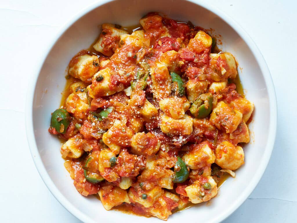 Ricotta and Egg Gnocchi with Olives, Capers, and Tomato Sauce