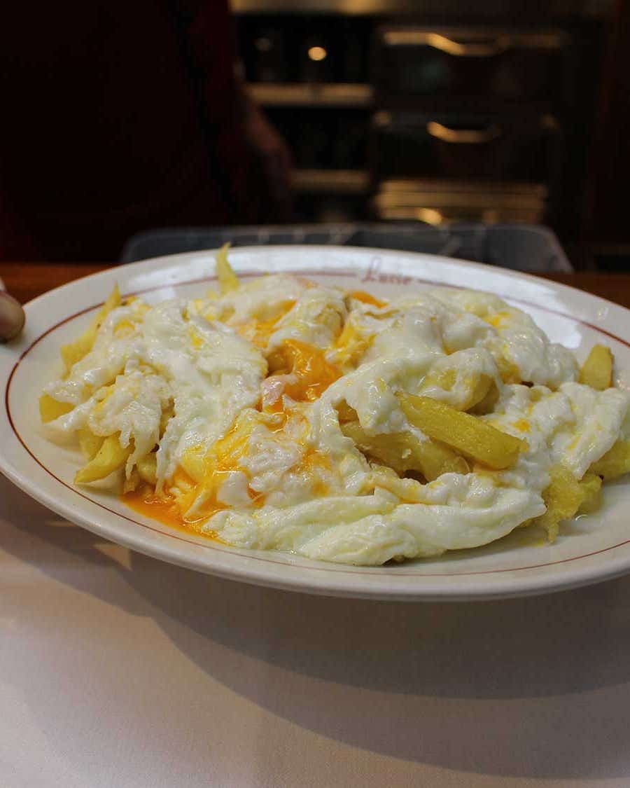 Olive Oil Fried Potatoes With Over Easy Eggs (Huevos Estrellados) Olive Oil Fried Potatoes With Over Easy Eggs (Huevos Estrellados)