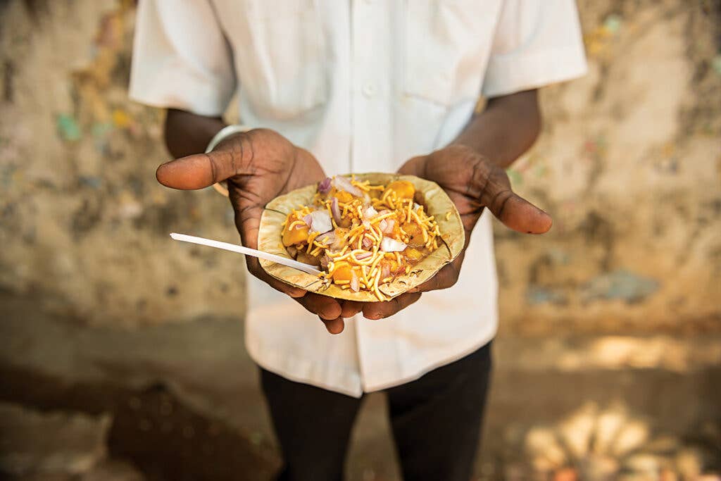 Man Holding Aloo Chana Chaat