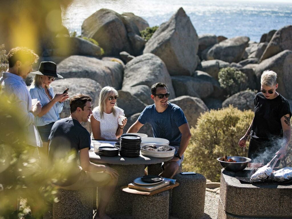 people socializing at a South African Braai