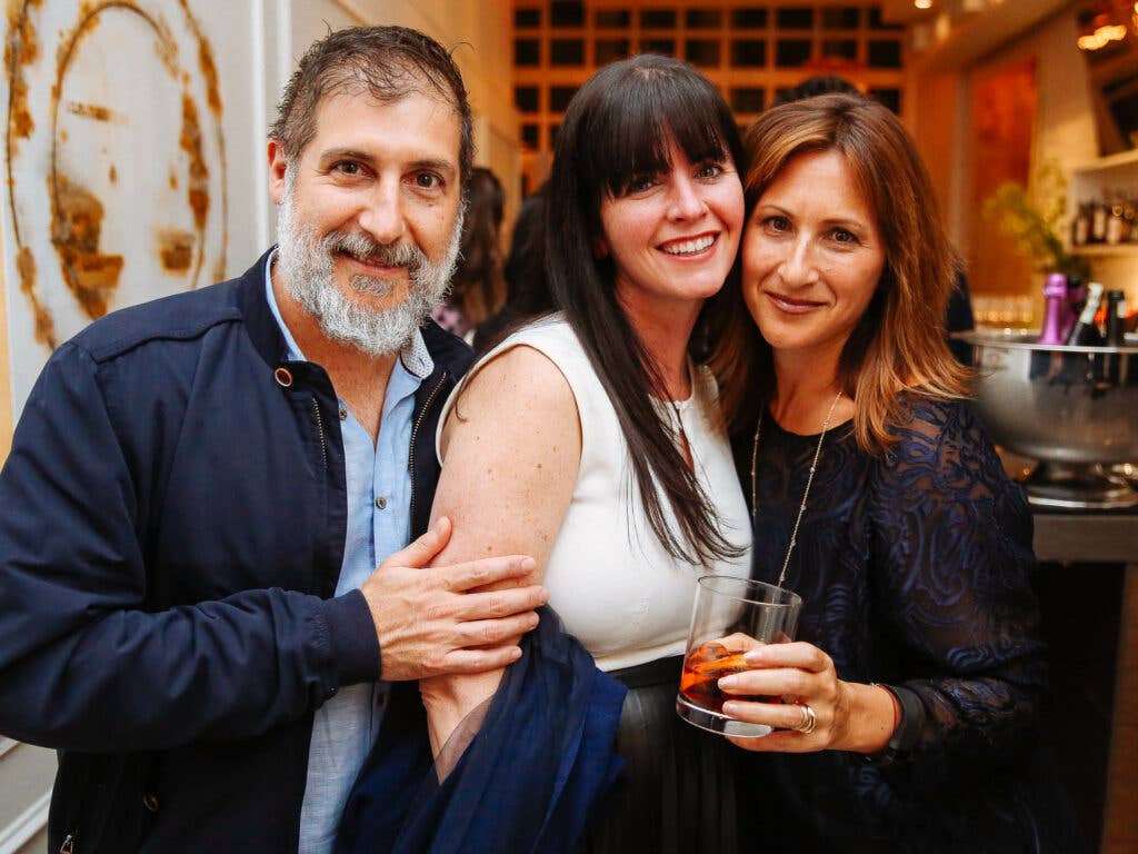 Writer Brett Moskowitz and SAVEUR publicists Stefanie McNamara and Perri Dorset lean in for a group shot at Fusco.