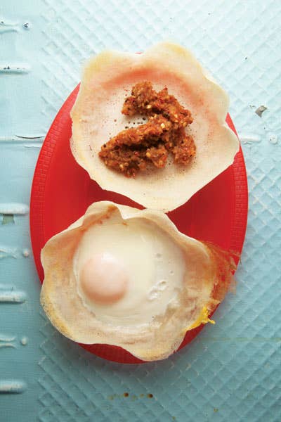 Hoppers (Sri Lankan Crêpes with Onion Sambol and Egg)