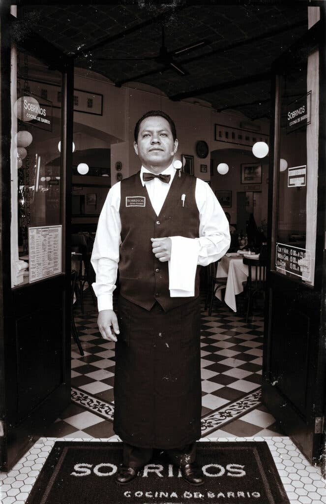 A waiter at Sobrinos, a restaurant in Mexico City.