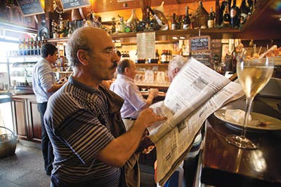 man reading newspaper