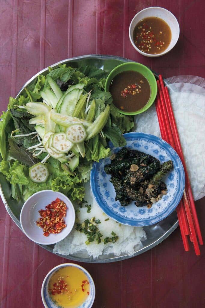 Rice paper rolls with grilled lemongrass beef betel leaves and star fruit