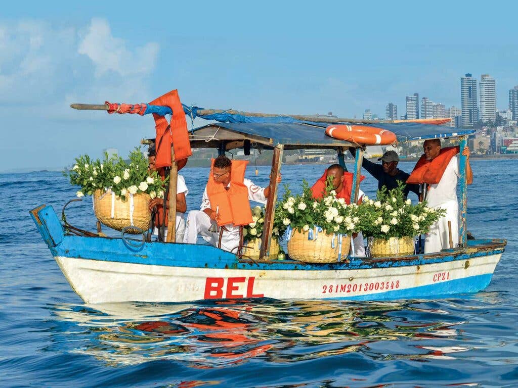 boat bearing floral tributes to sea-­goddess Iemanjá