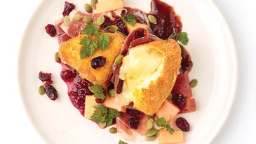 Fried Camembert with Ham, Melon, and Cranberry Vinaigrette