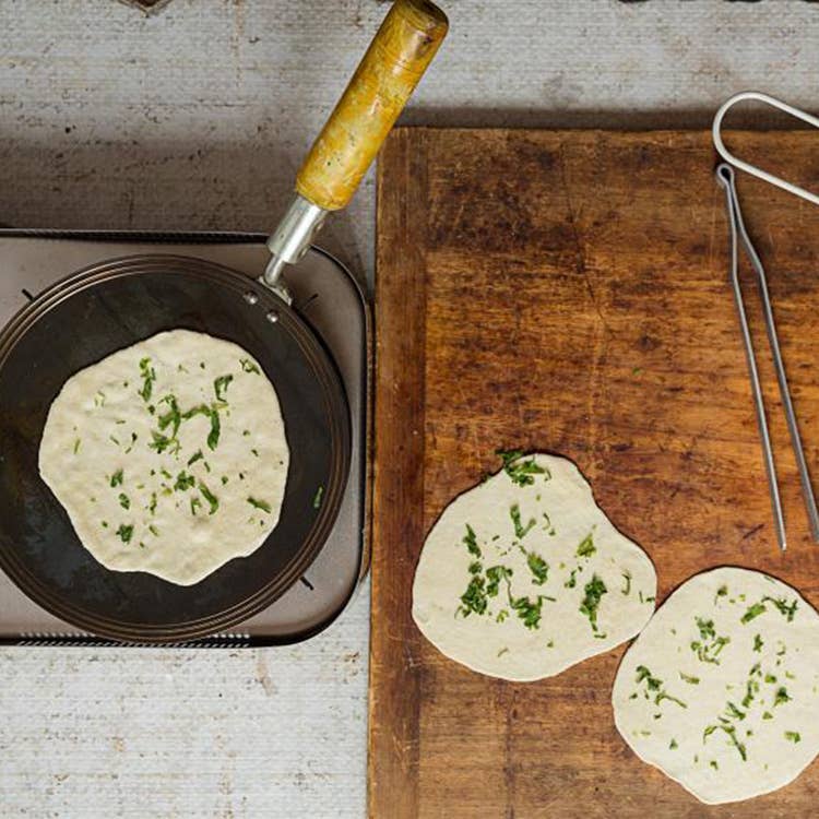 cooking naan bread