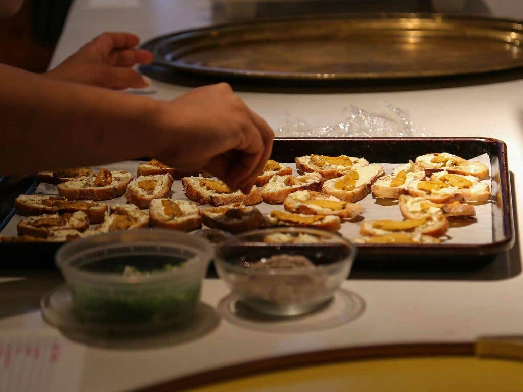 Piling uni on toast with plenty of butter and smoked salt