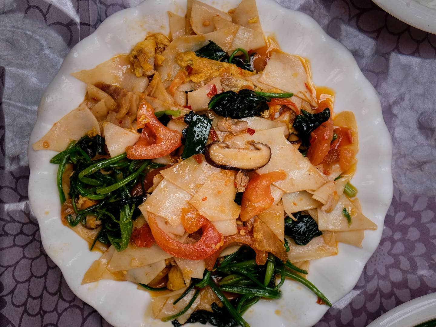 Stir-Fried Chinese Rice Cakes with Pork Belly, Tomatoes, and Spinach (Dajiujia)