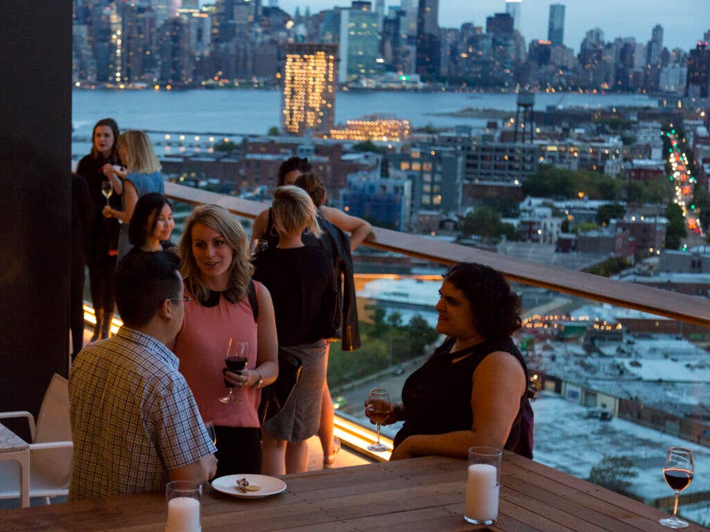 Bloggers take in the sunset at the William Vale hotel