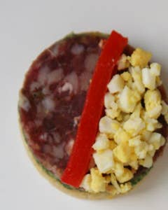 Salami and Chopped Egg Canapés with Fines Herbes Butter