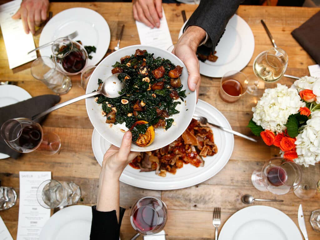 Roasted sunchokes with kale, hazelnuts and charred lemon