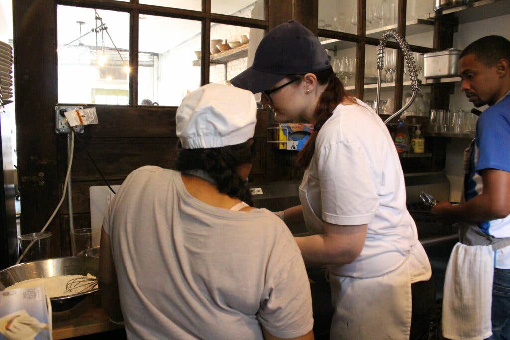 In the kitchen of Emma's Torch.