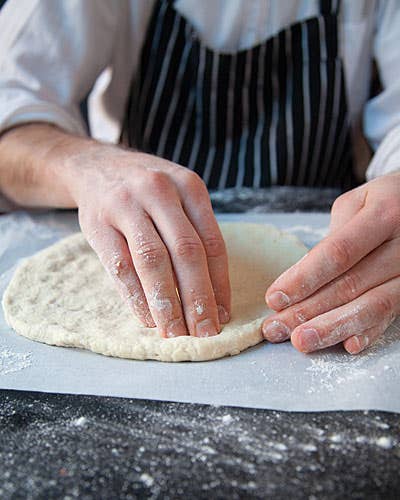 httpswww.saveur.comsitessaveur.comfilesimport2010images2010-02634-127_making_homemade_pizza_2_400.jpg