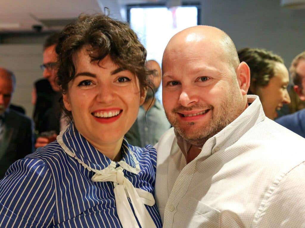 Ellen Bennett and chef Dan Kluger smile for the camera.