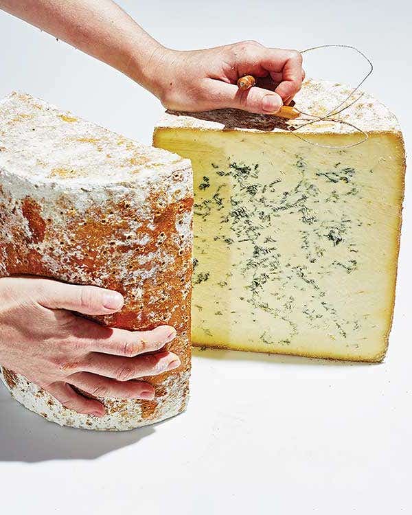 In Praise of Stilton, the Perfect Holiday Cheese Cutting open a wheel of stilton with a cheese wire.