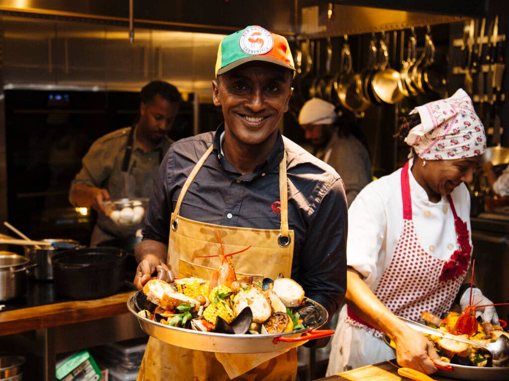 Marcus Samuelsson and his giant plate of Harlem chowder