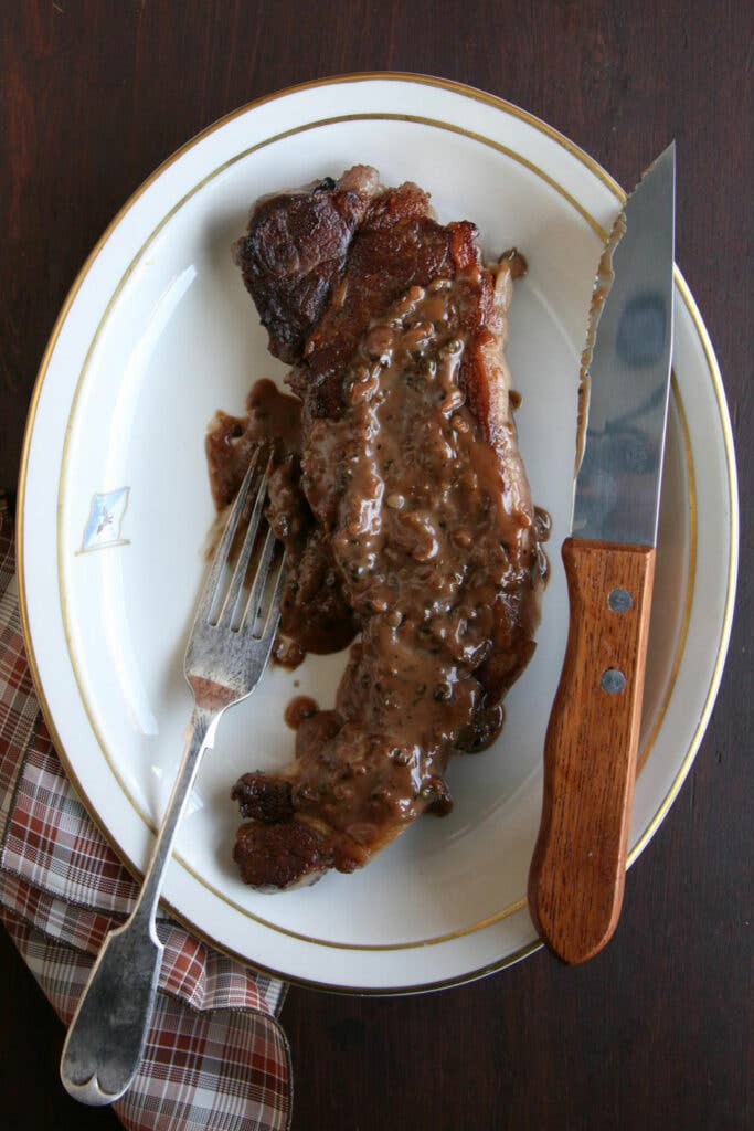 Strip Steaks with Green Peppercorn Sauce