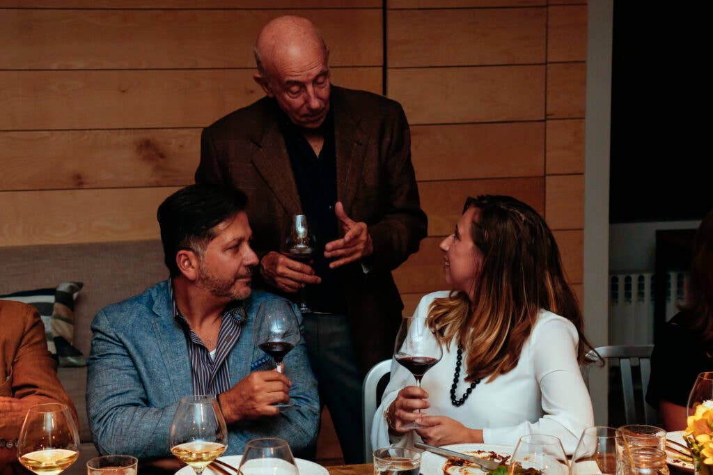 Lynmar Estate's Lynn Fritz chatting with Anthony Giglio and Marie Christina Batich.
