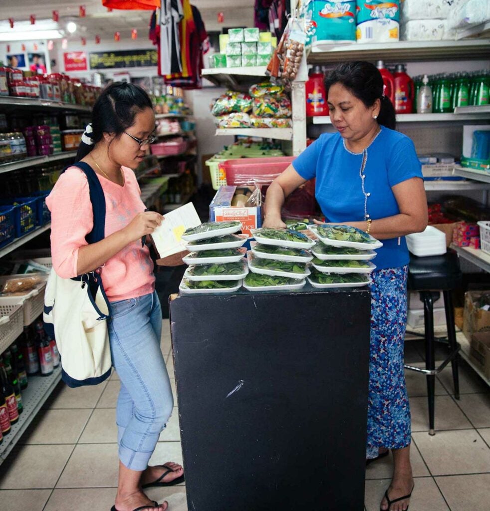 Nancy (left) and Paw (right) at Paw's Aphone Market