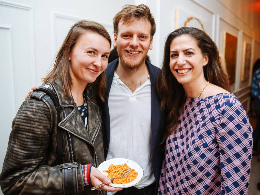 Olga Grigorenko, photographer William Hereford and publicist Evyn Block are all smiles.