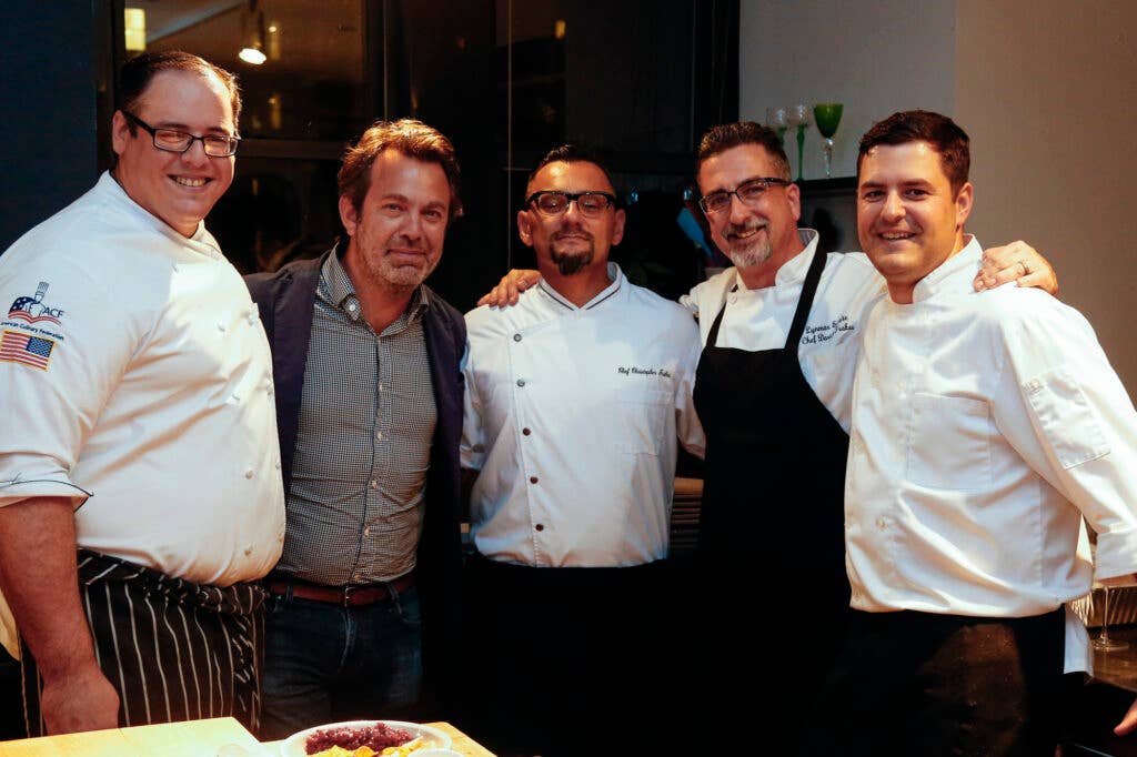 Editor-in-Chief Adam Sachs with the Lynmar Estate kitchen team.
