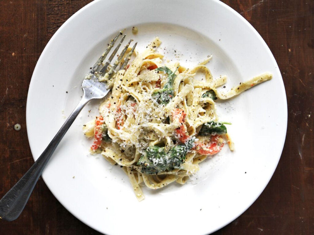 Fettuccine with Pesto Cream Sauce, Roasted Red Peppers, and Spinach